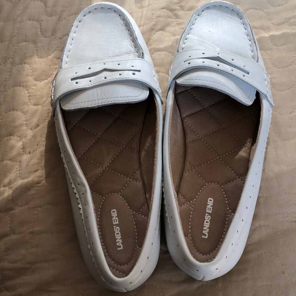 White leather loafers